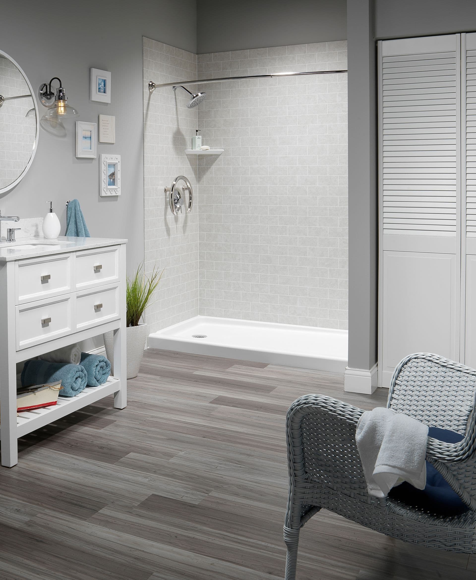 gray shower with chair and sink